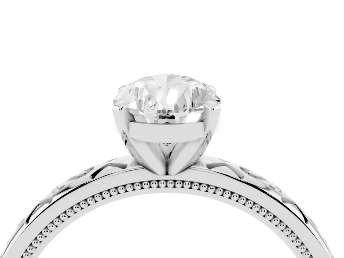 Pear Cut Solitaire Engagement Ring with Scrollwork Band and Four-Prong Setting White gold