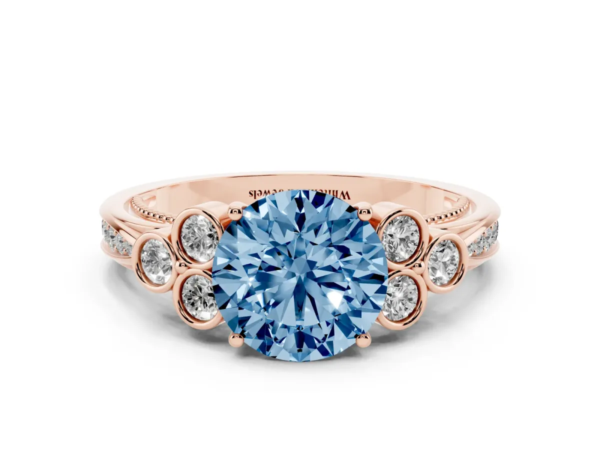 Fancy Blue Round Cut Cut Diamond Engagement Ring with Bezel Set Round Side Stones and Prong Setting Rose gold
