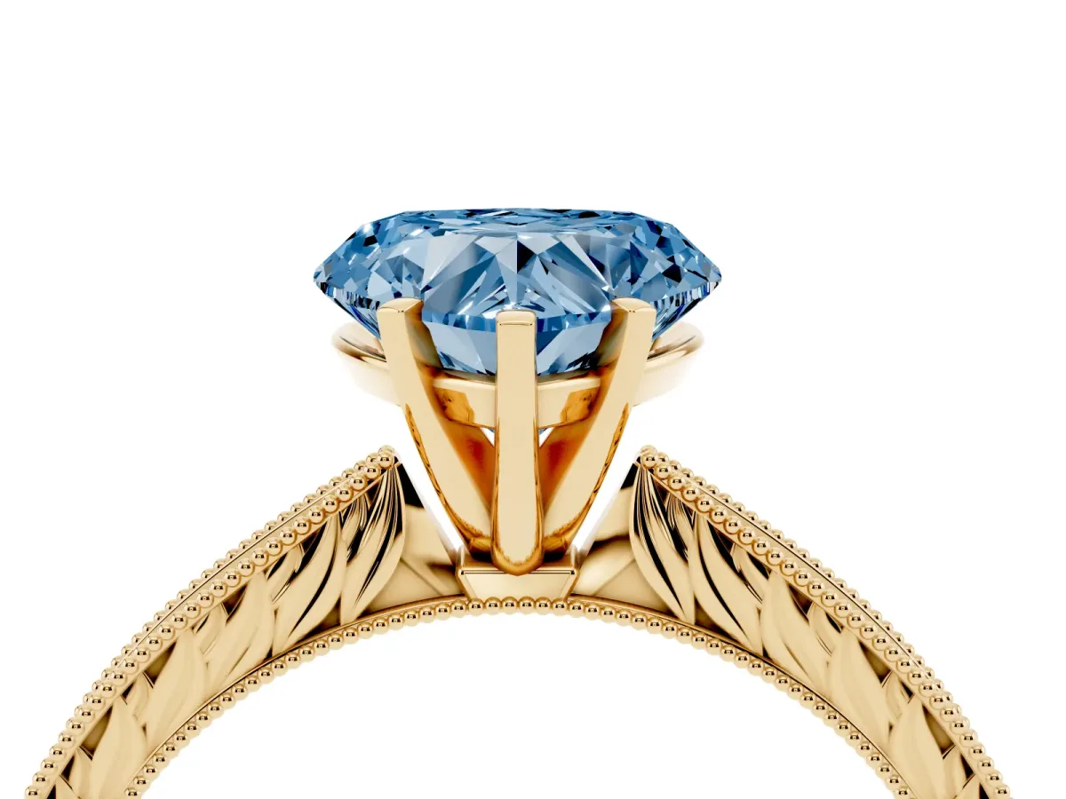 Fancy Blue Heart Cut Solitaire Milgrain Engraved Band with Four-Prong Setting Yellow gold