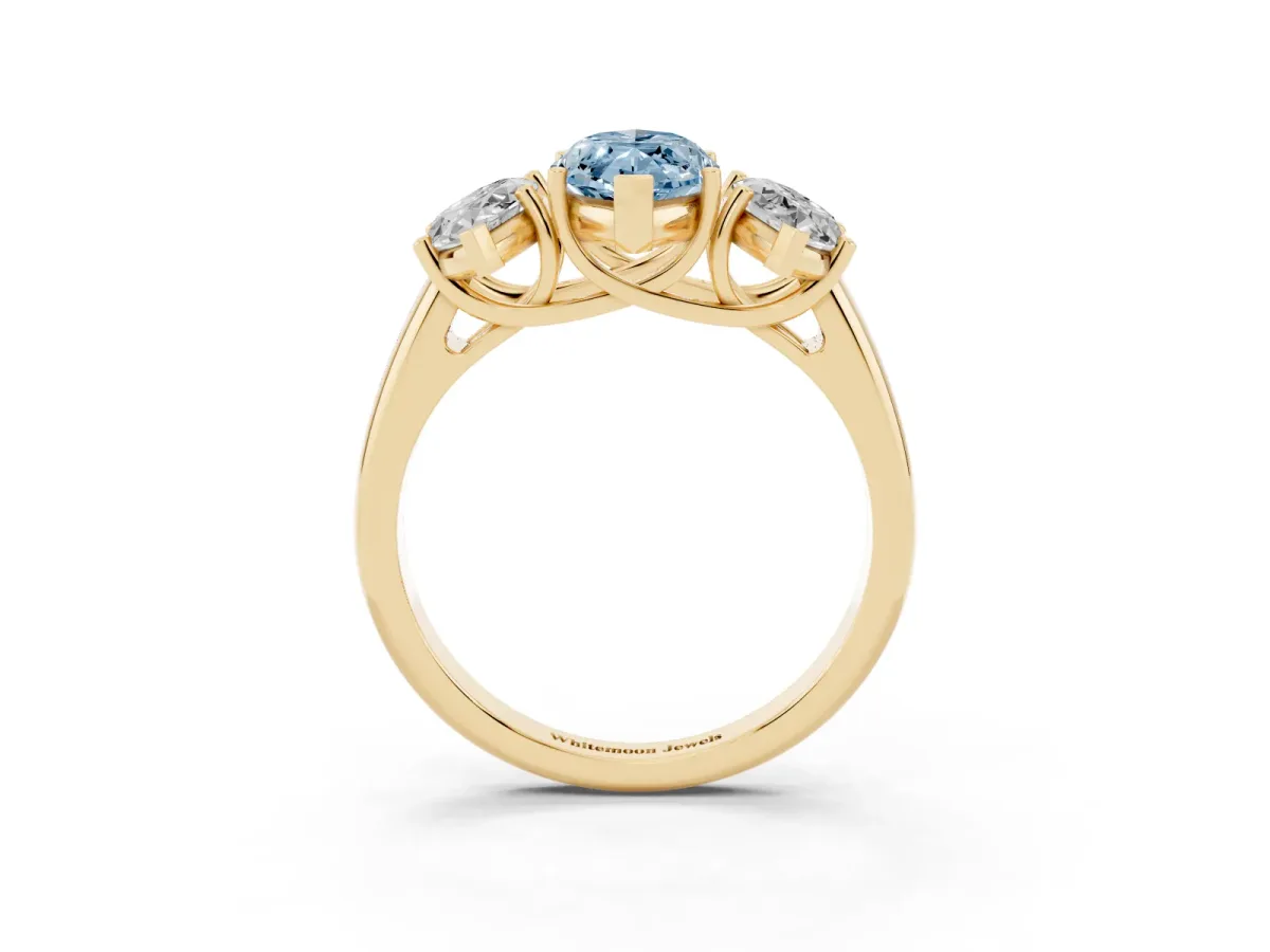 Fancy Blue Three-Stone Marquise Cut Diamond Engagement Ring with Prong Setting Yellow gold