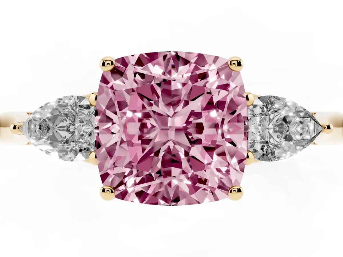 Fancy Pink Cushion Cut Diamond Three-Stone Ring with Pear Side Stones and Prong Setting Yellow gold