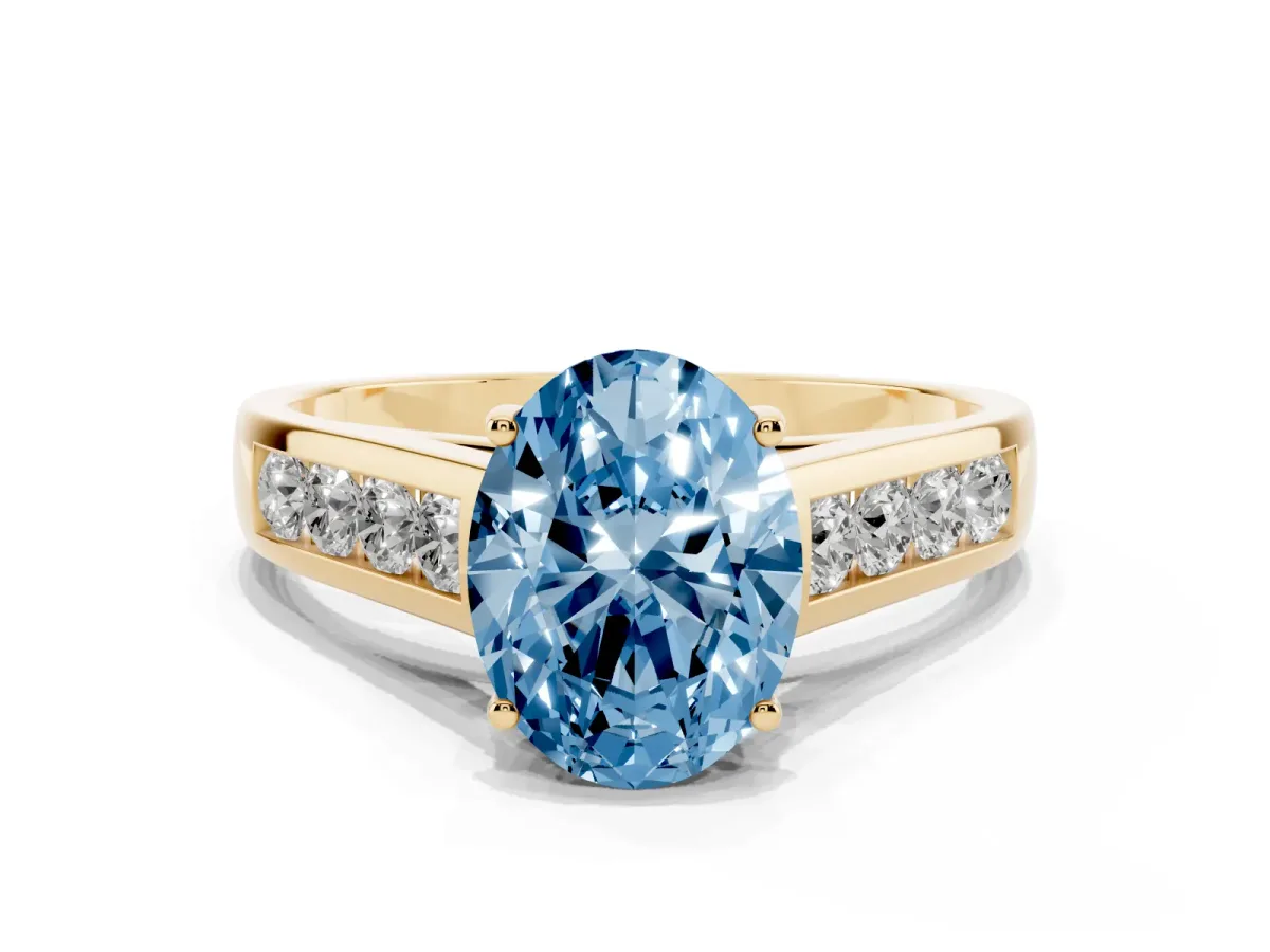 Fancy Blue Oval Cut Brilliant Channel-Set Solitaire Ring with Four-Prong Setting Yellow gold