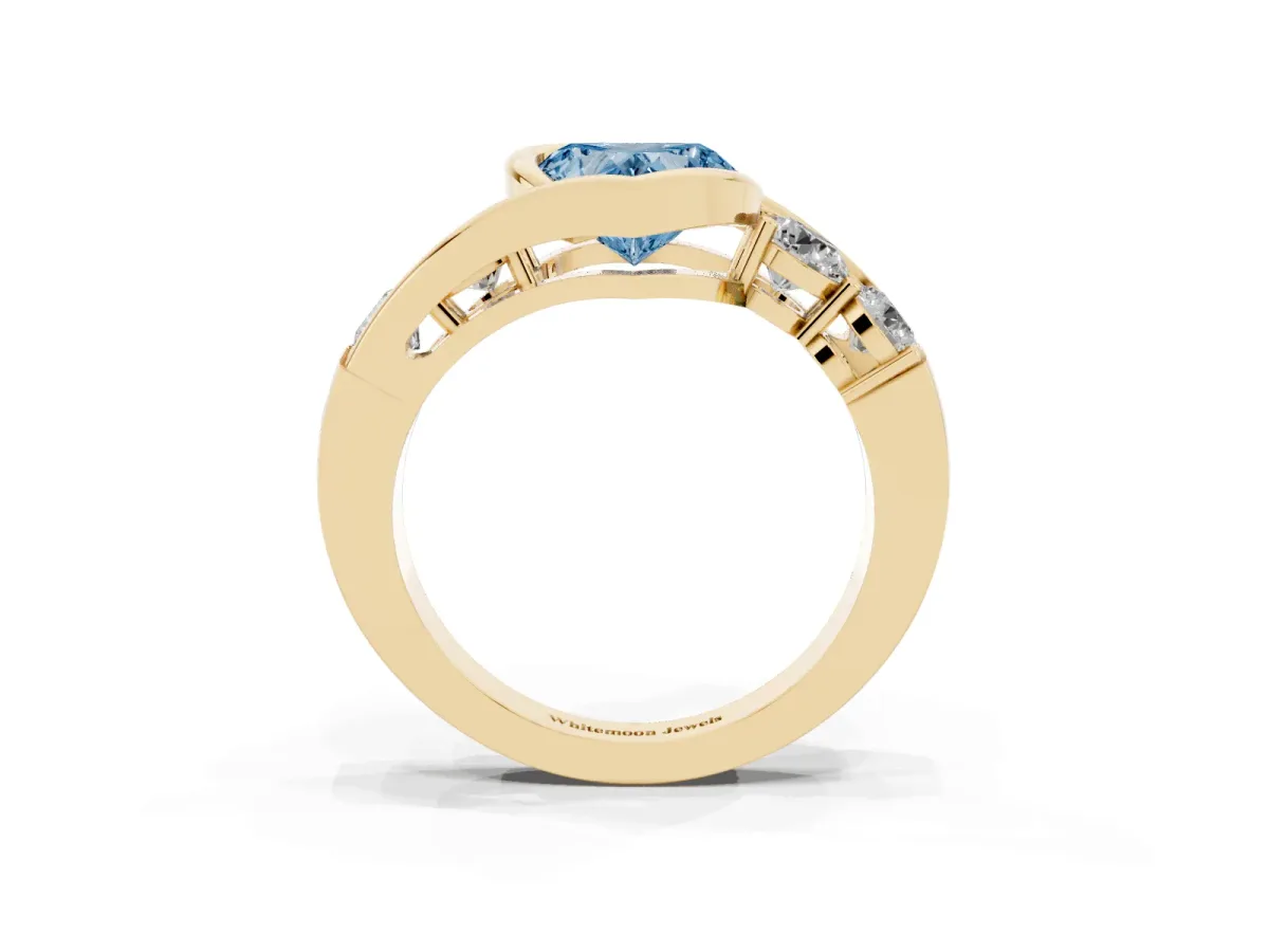 Fancy Blue Bezel Set Heart Cut Diamond Bypass Ring with Round Accents Yellow gold