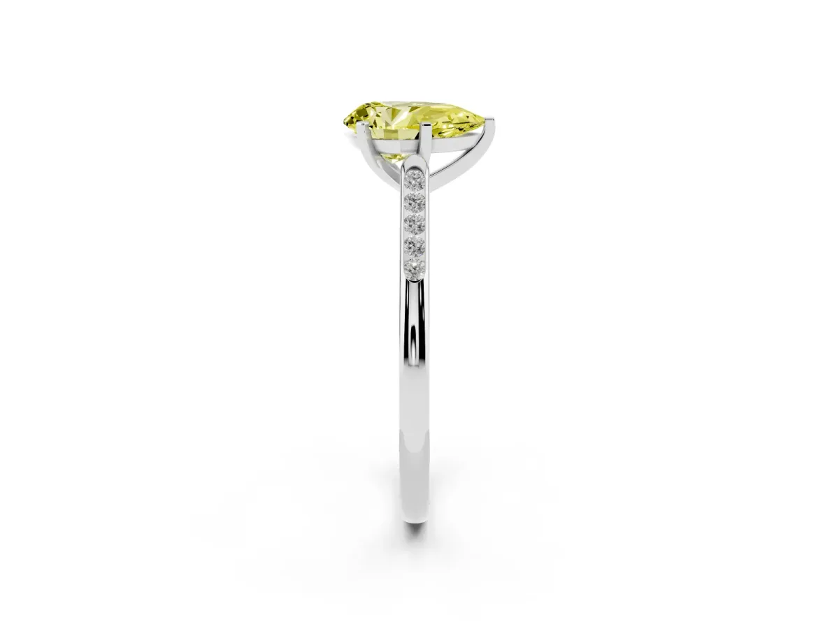Fancy Yellow Pear Cut Diamond Solitaire Ring with Channel Set Round Band and Prong Setting Silver