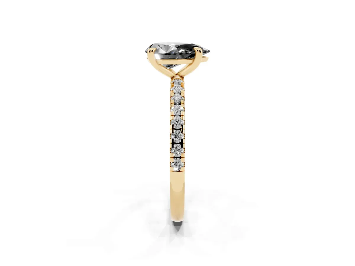 Fancy Black Pear Cut Diamond Brilliant Solitaire Ring with Pavé Band and Four-Prong Setting Yellow gold