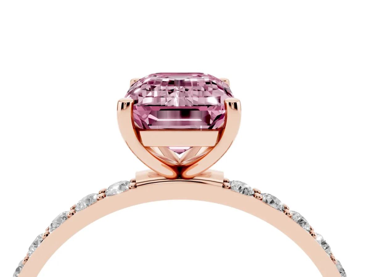 Fancy Pink Emerald Cut Diamond Solitaire Ring with Round Pavé Shoulders and Prong Setting Rose gold
