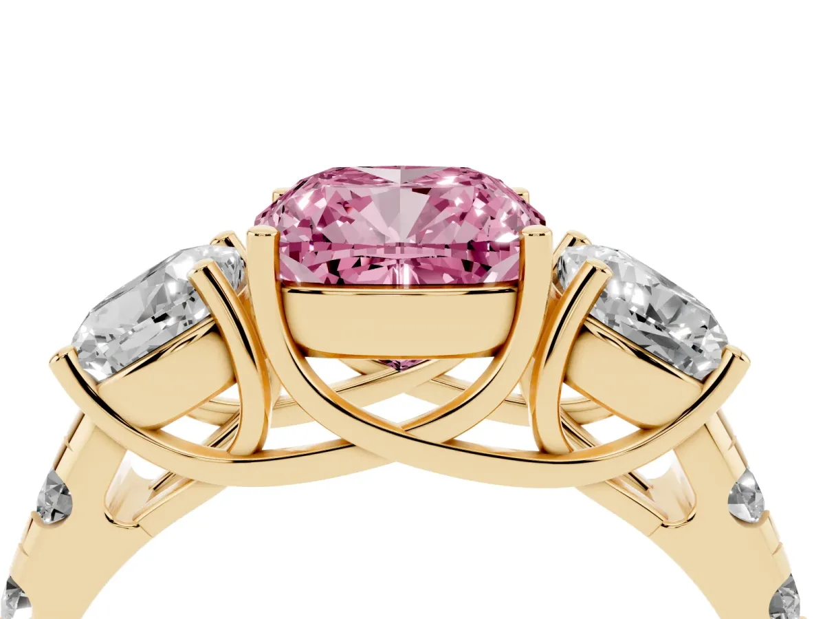 Fancy Pink Three-Stone Cushion Cut Diamond Pavé Band with Prong Setting Yellow gold