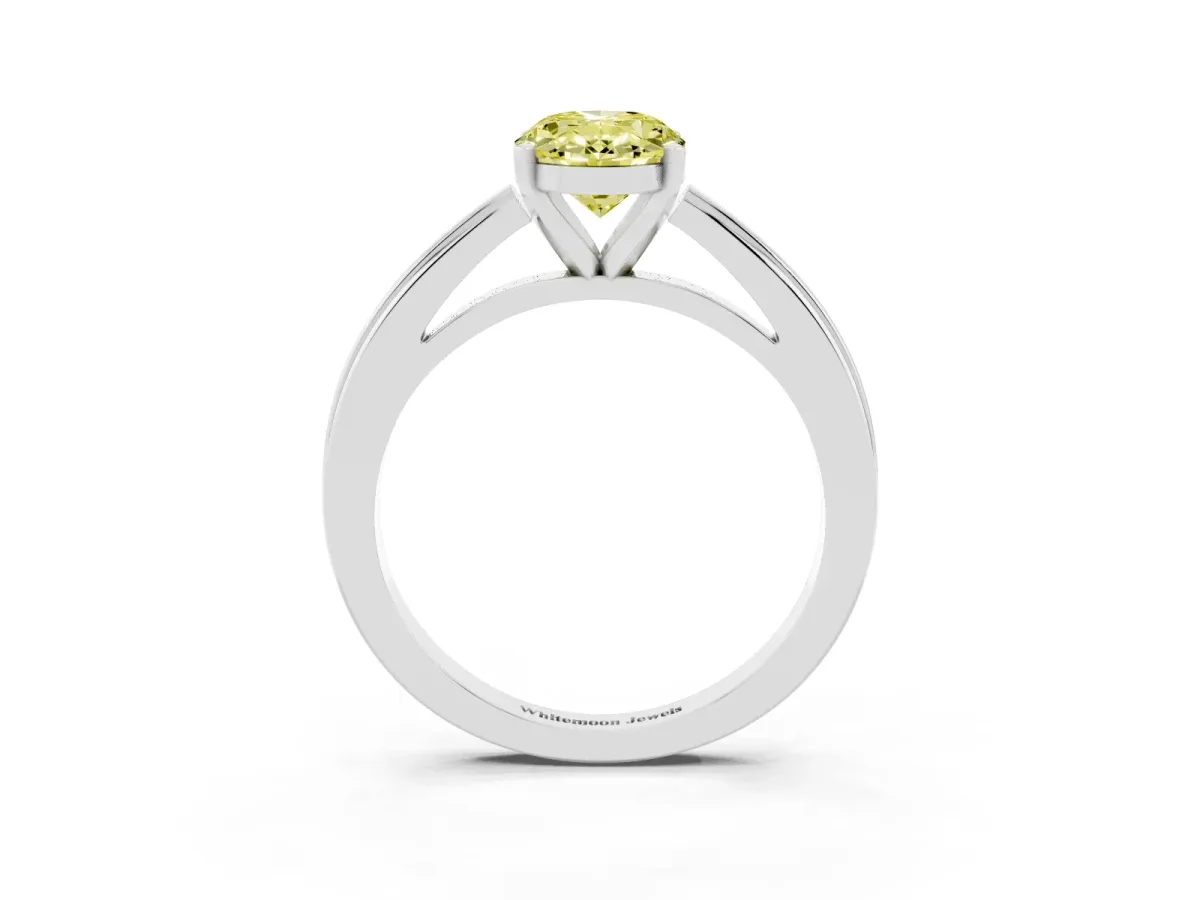 Fancy Yellow Oval Cut Solitaire Diamond Ring with Four-Prong Setting and Classic Band Platinum
