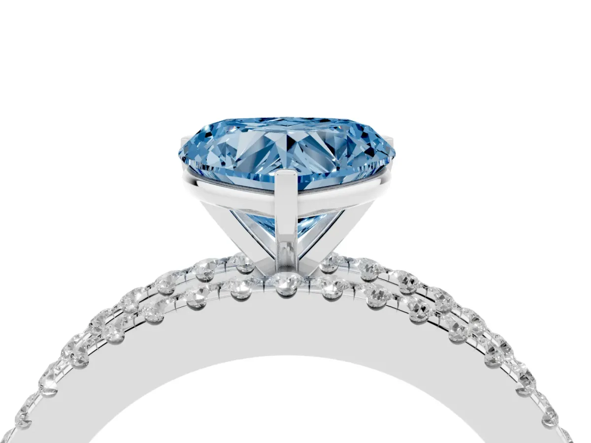Fancy Blue Heart Cut Diamond Solitaire Ring with Pavé and Channel Set Band Platinum