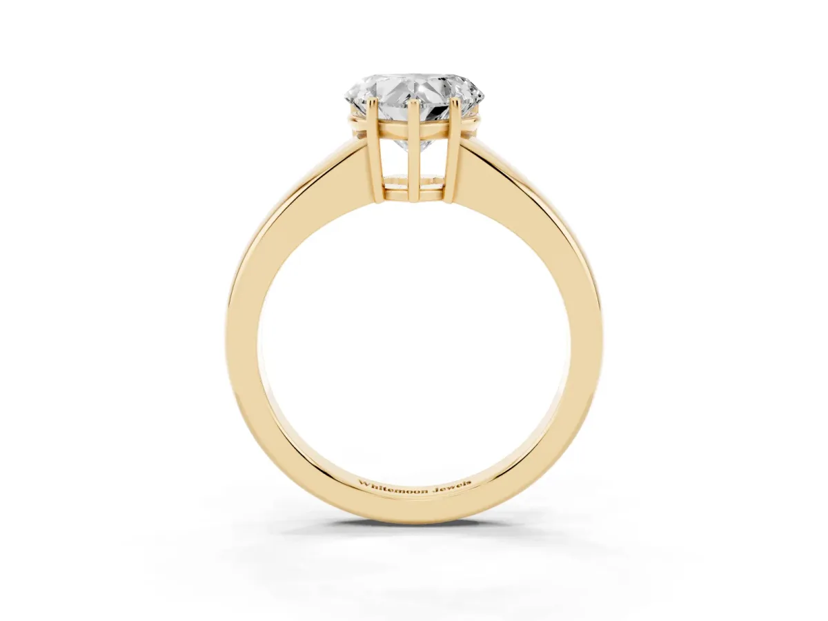 Heart Cut Solitaire Diamond Ring with Tapered Band and Four-Prong Setting Yellow gold