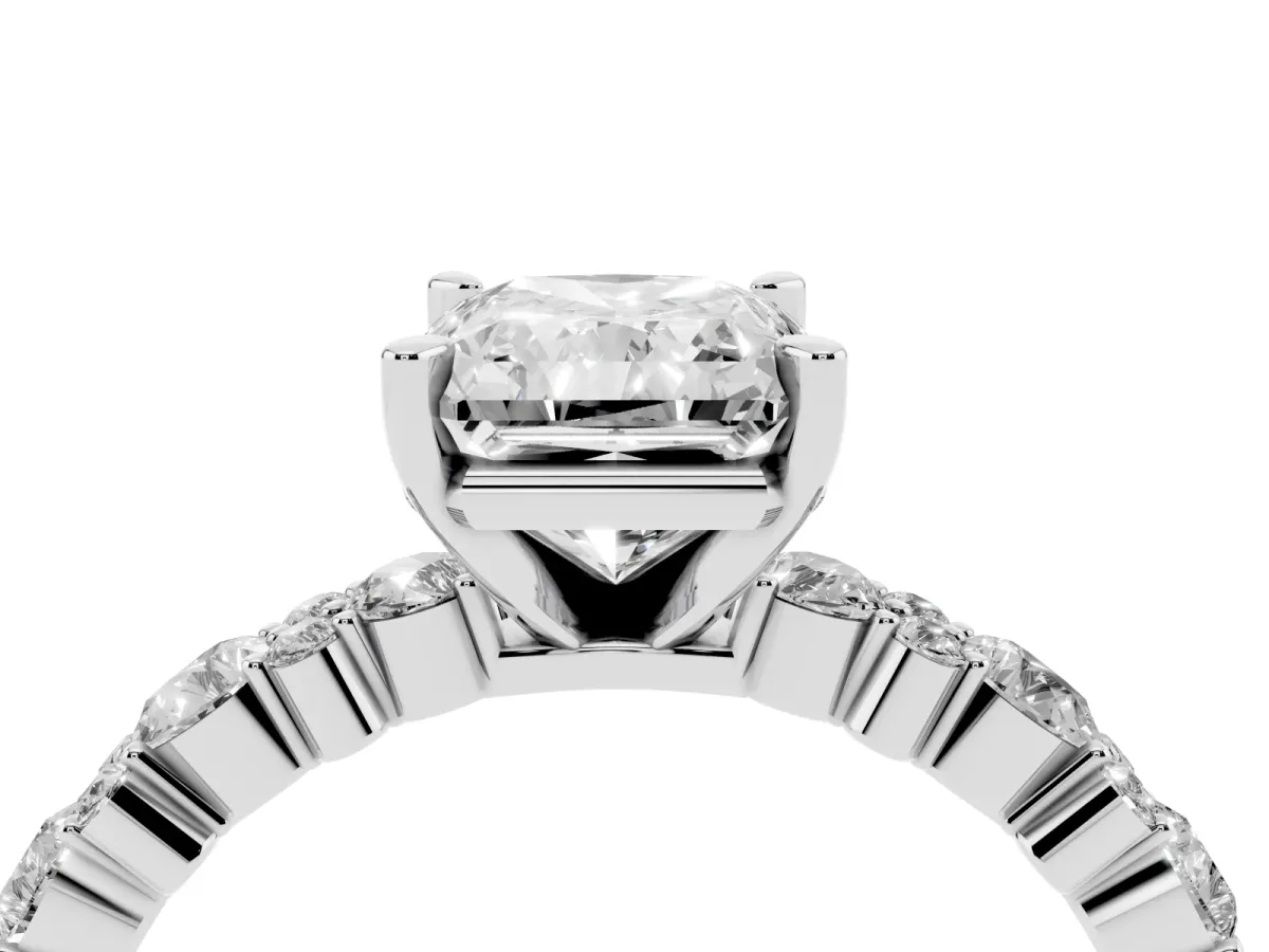 Radiant Cut Diamond Side Stone Solitaire Ring with Round and Four-Prong Setting Platinum