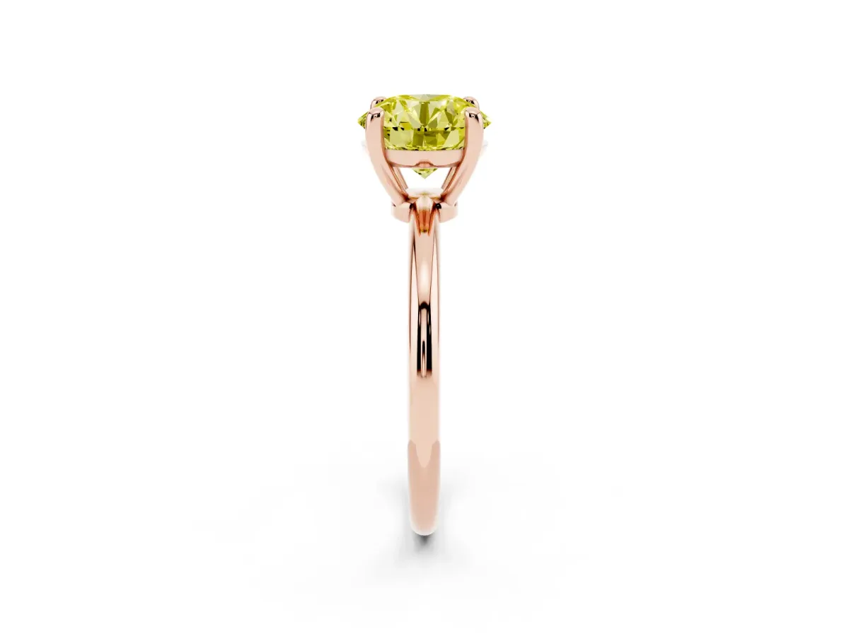 Fancy Yellow Round Cut Solitaire Diamond Ring with 4-Prong Setting on a Classic Band Rose gold