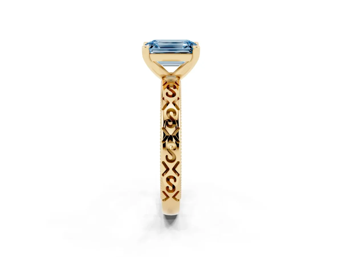 Fancy Blue Emerald Cut Solitaire Engagement Ring with Scrollwork Band and Four-Prong Setting Yellow gold