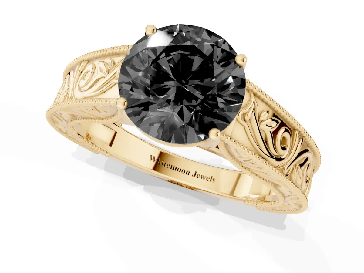 Fancy Black Round Cut Diamond Solitaire Ring with Engraved Band and Four-Prong Setting Yellow gold