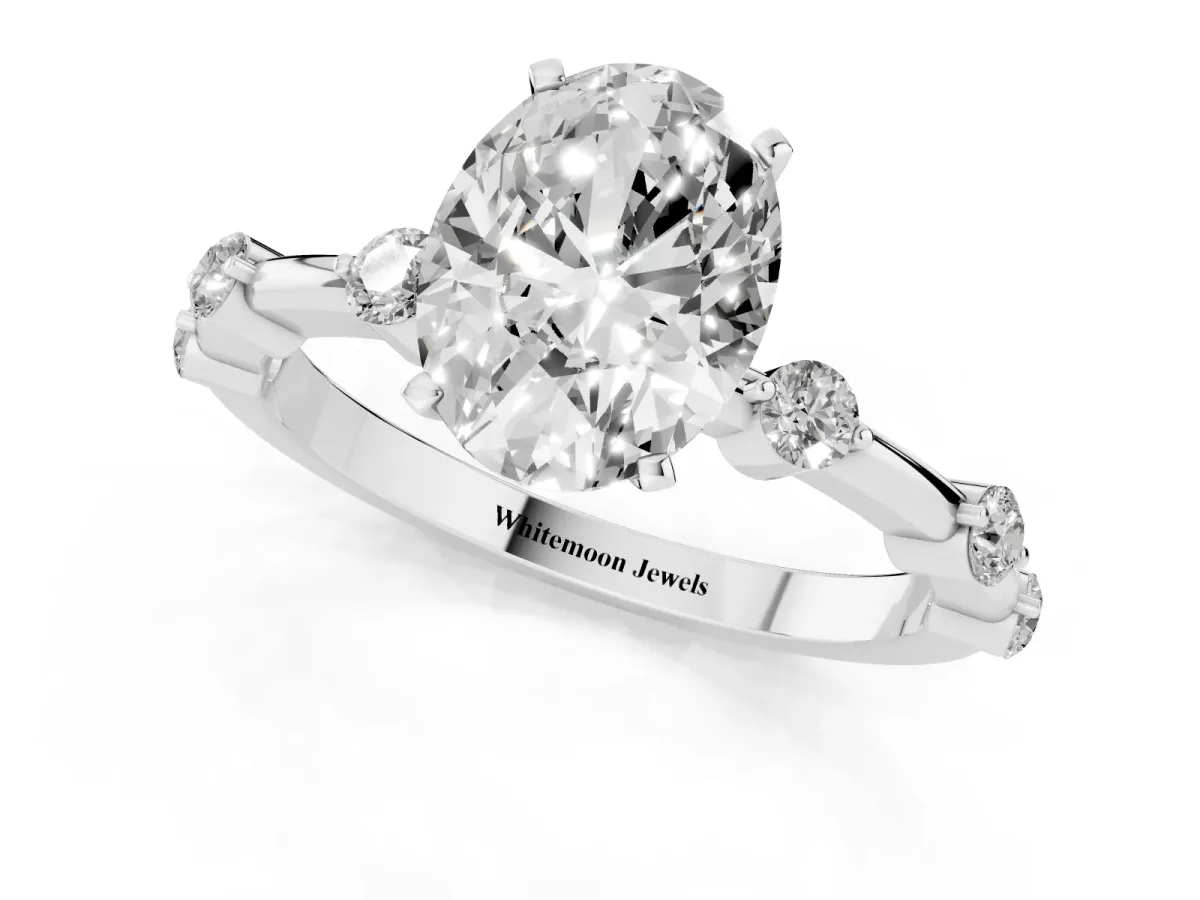 Oval Cut Solitaire Diamond Ring with Bezel Set Side Stones and Prong Setting Platinum