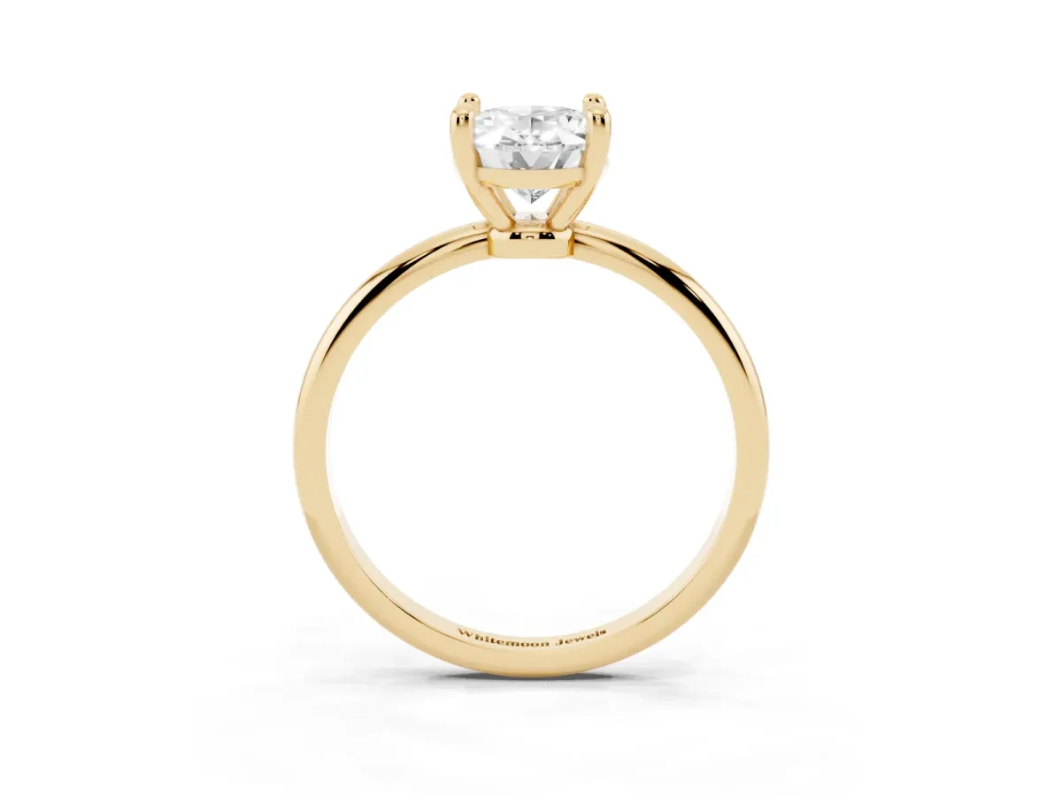 Oval Cut Solitaire Diamond Ring with 4-Prong Setting on a Classic Band Yellow gold