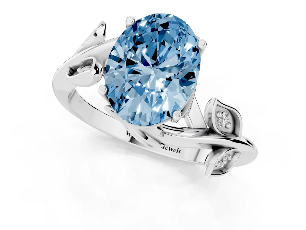 Fancy Blue Oval Cut Solitaire Twist Engagement Ring with Leaf Accents and Prong Setting Silver