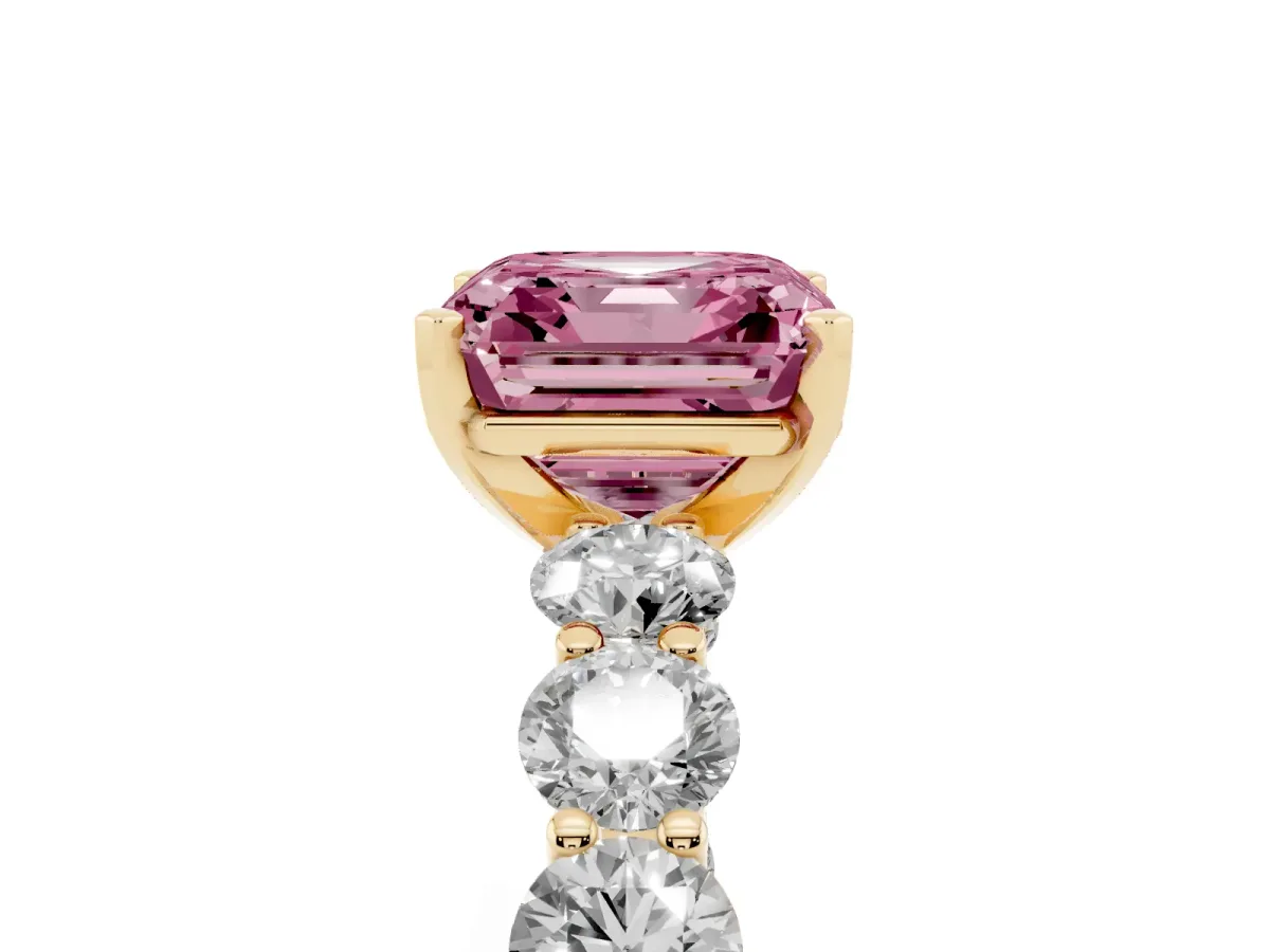 Fancy Pink Asscher Cut Diamond Prong Setting with Side Stones on a Pave Band Yellow gold