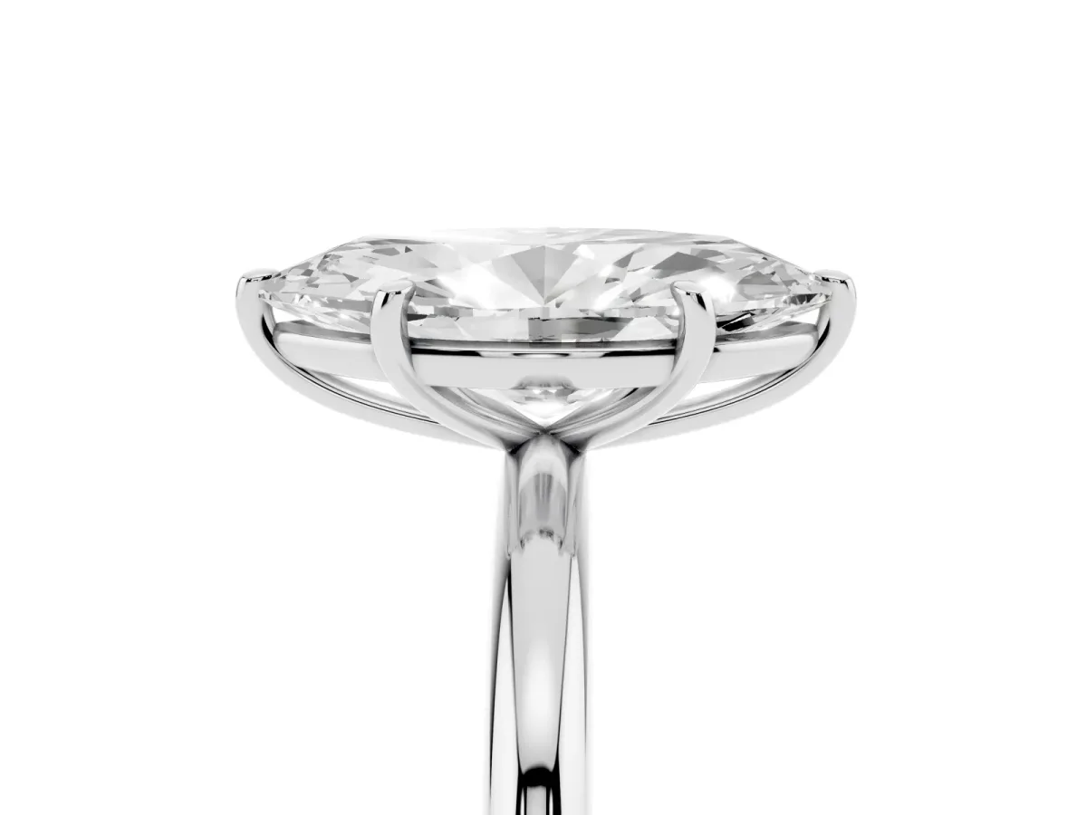 Marquise Cut Solitaire Diamond Ring with Four-Prong Setting on a Plain Band Platinum