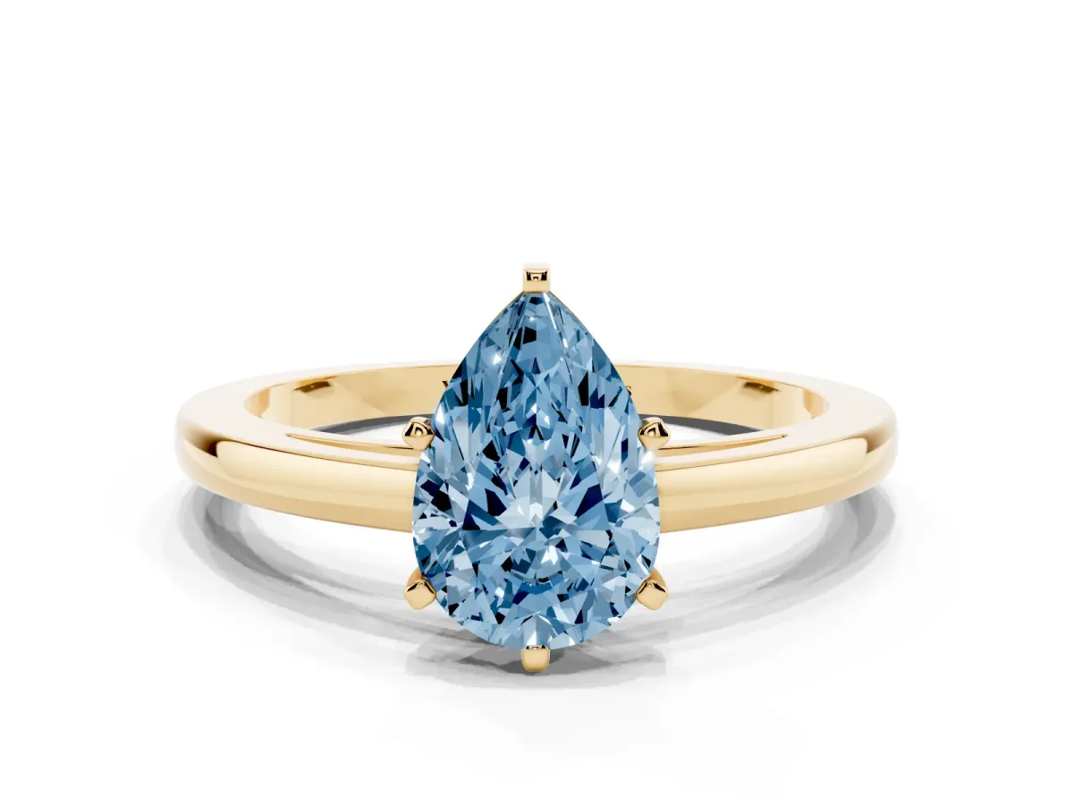 Fancy Blue Pear Cut Solitaire Diamond Engagement Ring with Four-Prong Setting on a Classic Band Yellow gold