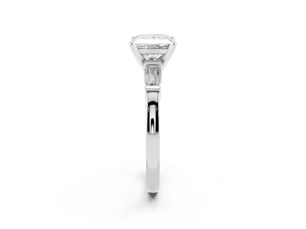 Princess Cut Cut Diamond Solitaire Ring with Tapered Baguette Accents and Four-Prong Setting Silver