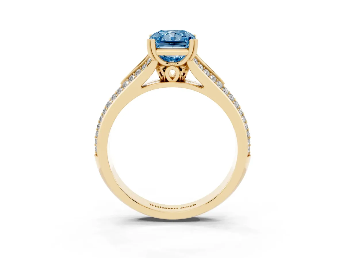 Fancy Blue Radiant Cut Diamond Split Shank Engagement Ring with Pavé Band Yellow gold