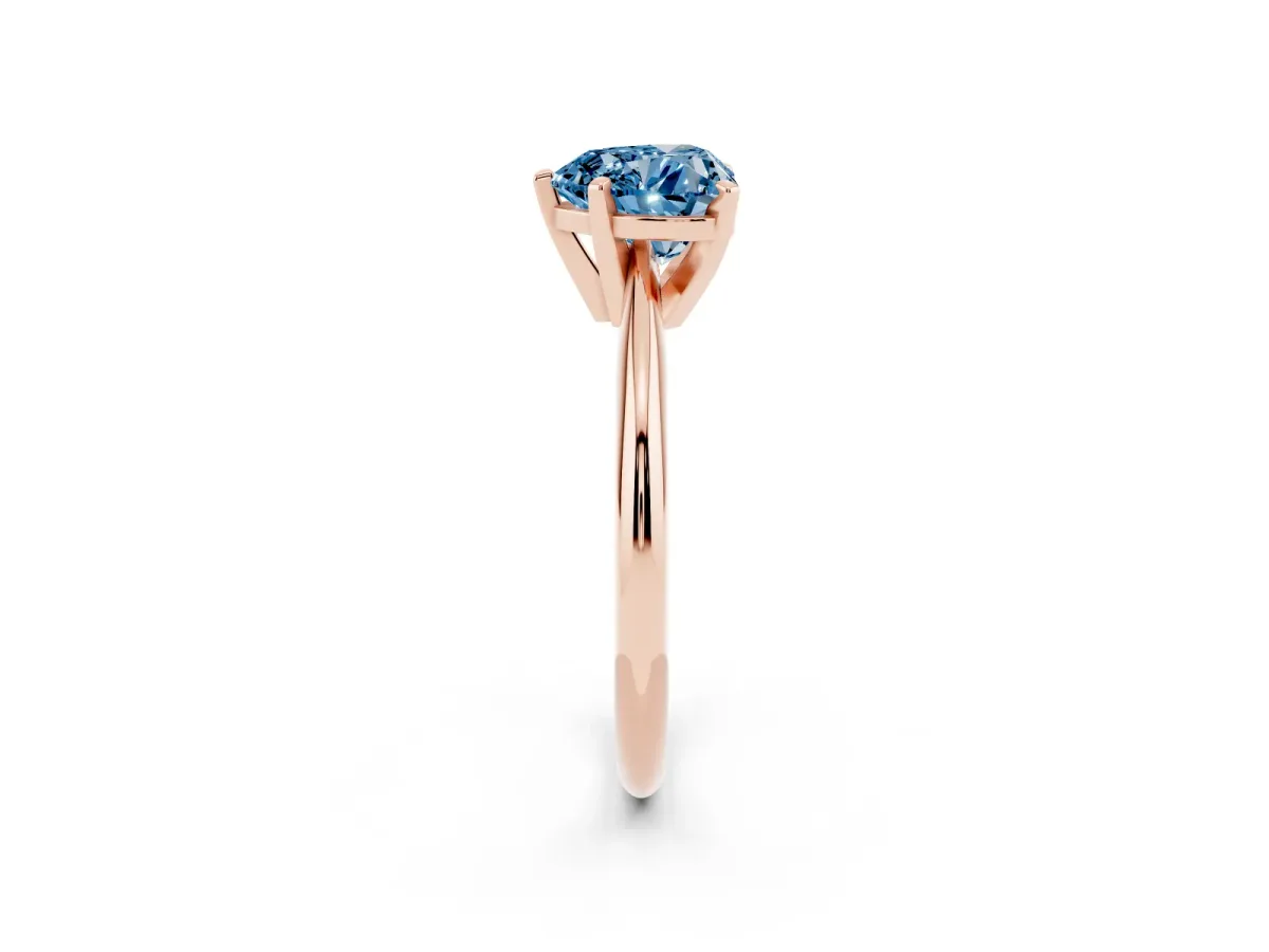 Fancy Blue Heart Cut Cut Solitaire Ring with Four-Prong Setting on a Classic Band Rose gold