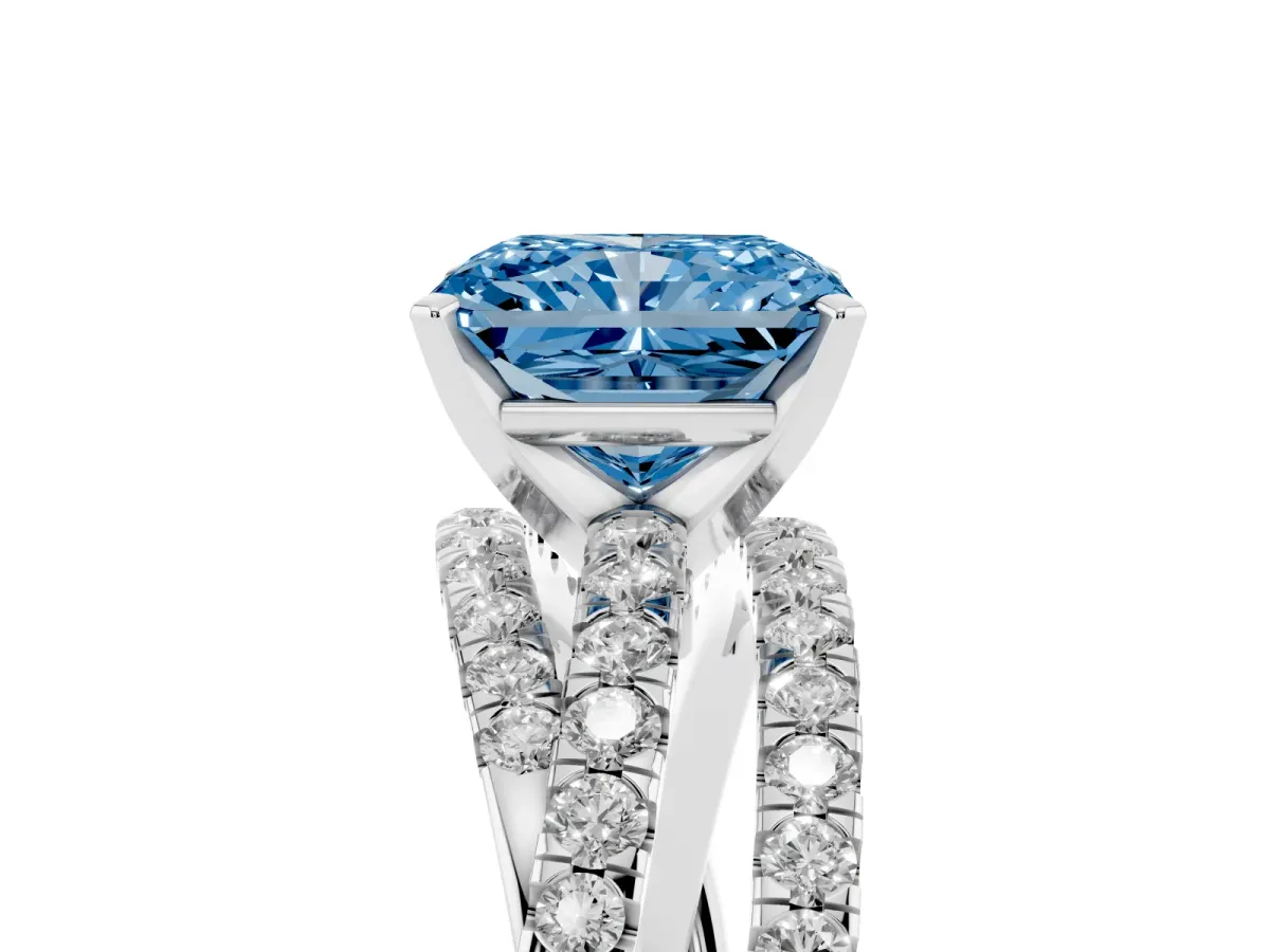 Fancy Blue Radiant Cut Solitaire Twist Band with Pavé Setting and Four-Prong Setting Silver