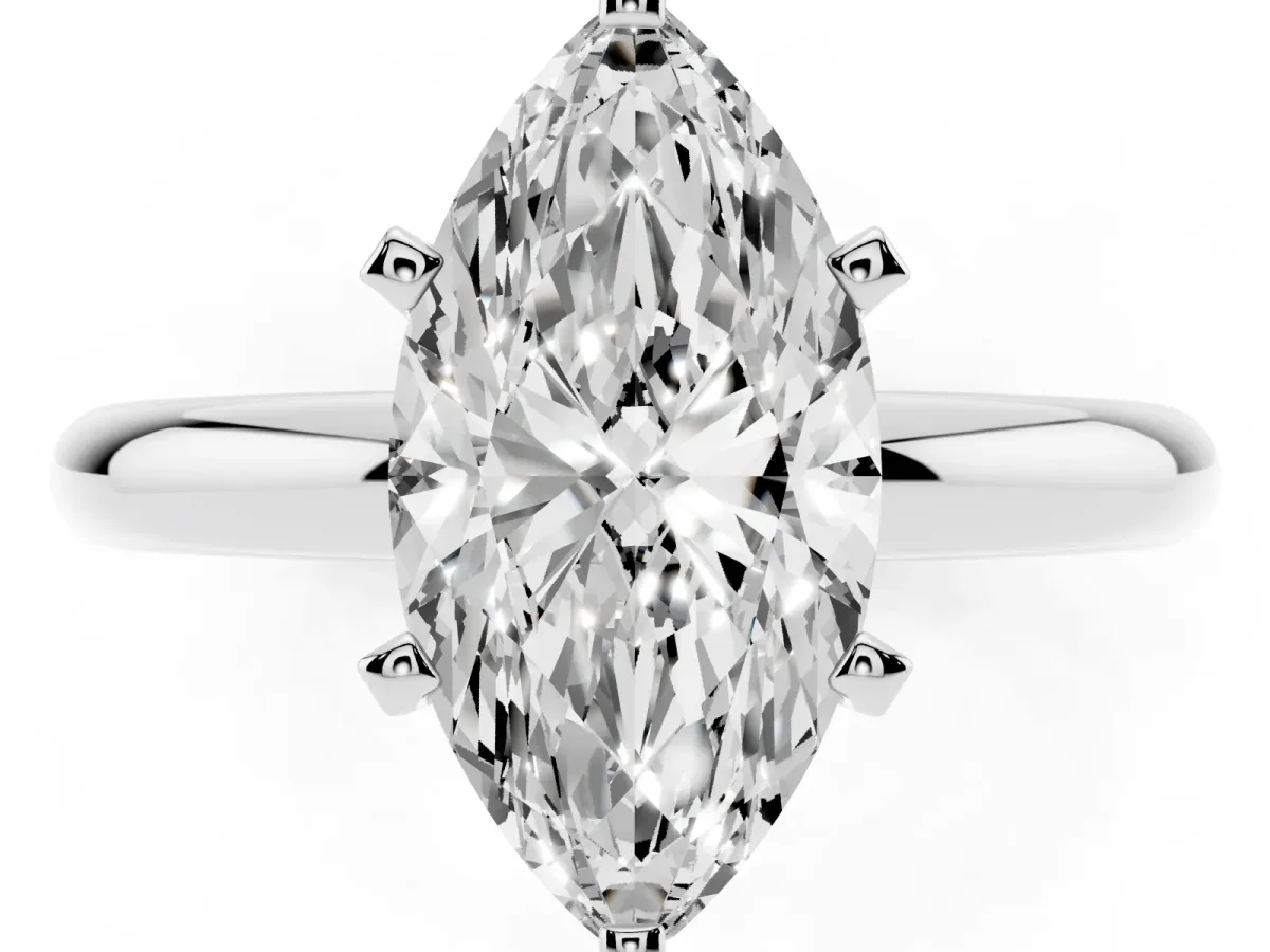 Marquise Cut Diamond Solitaire Engagement Ring with Round Band and Four-Prong Setting Platinum