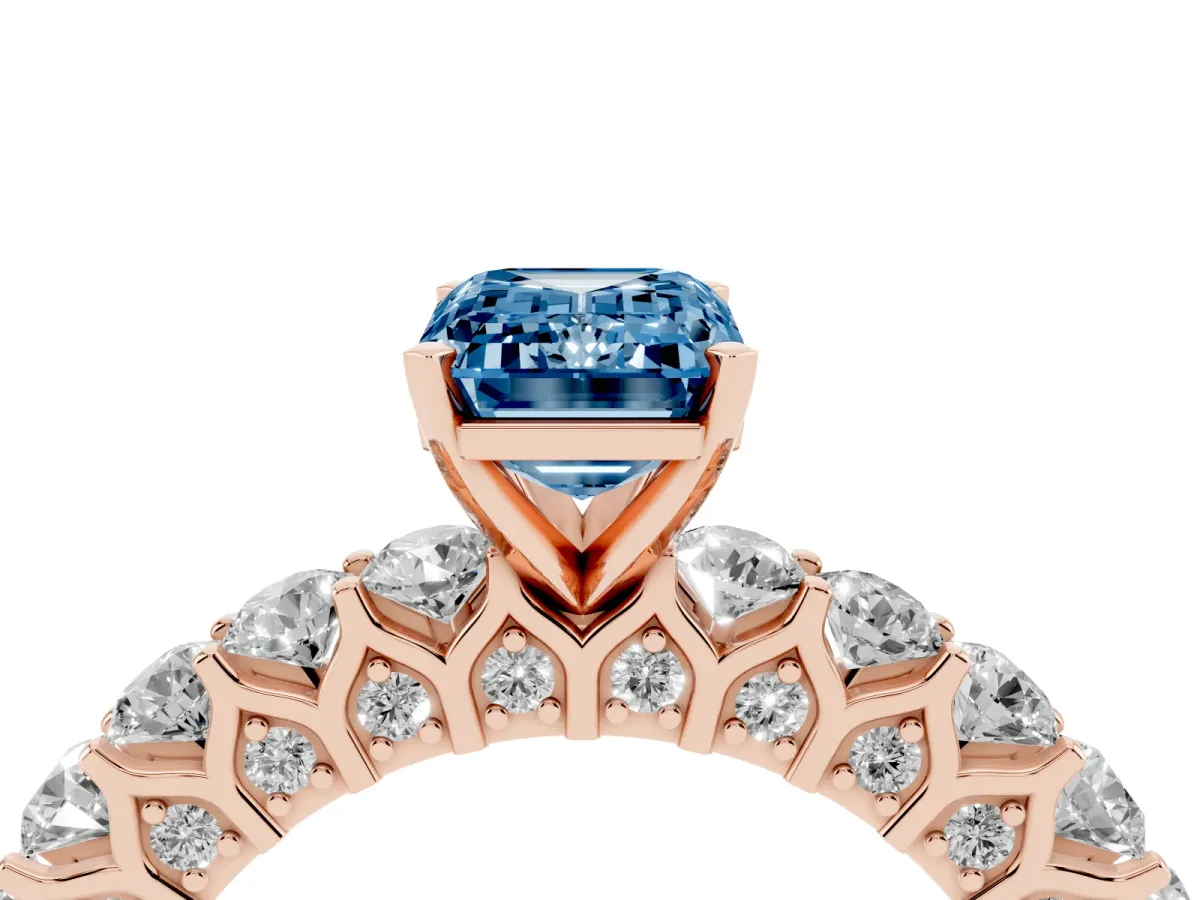 Fancy Blue Emerald Cut Diamond Solitaire Ring with Shared Prong Pavé Band and Four-Prong Setting Rose gold