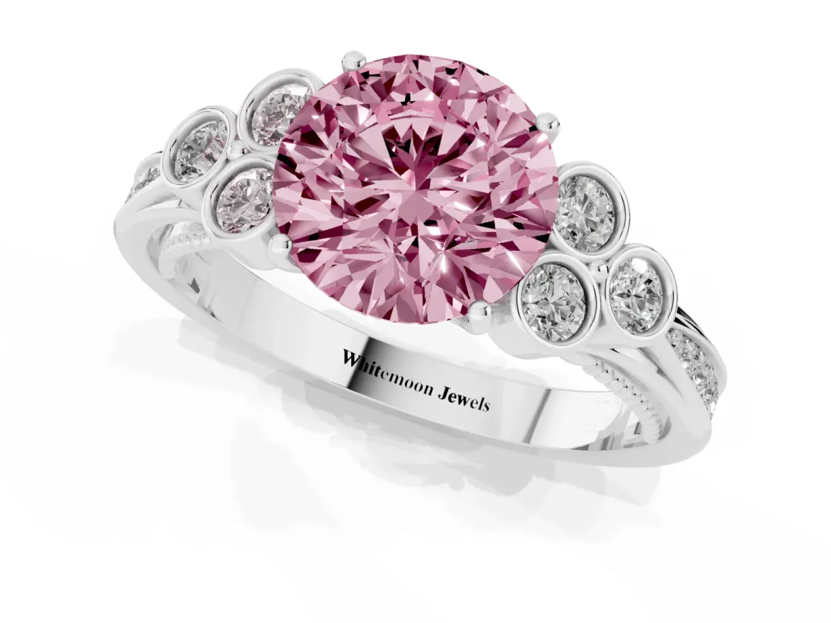 Fancy Pink Round Cut Cut Diamond Engagement Ring with Bezel Set Round Side Stones and Prong Setting Silver