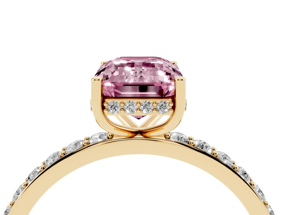 Fancy Pink Emerald Cut Diamond Solitaire Ring with Pavé Band and Hidden Halo Yellow gold