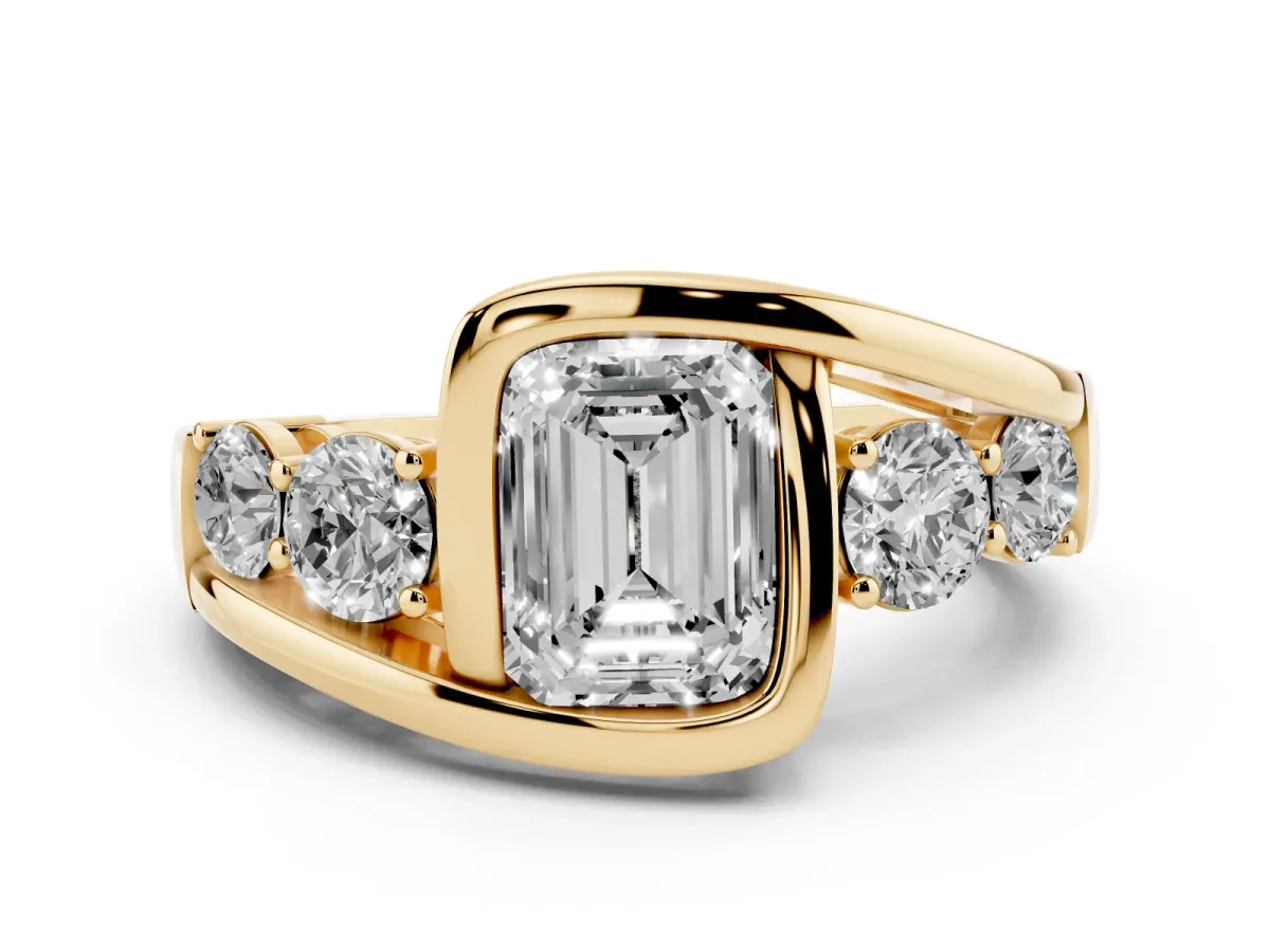 Bezel Set Emerald Cut Diamond Bypass Ring with Round Accents Yellow gold