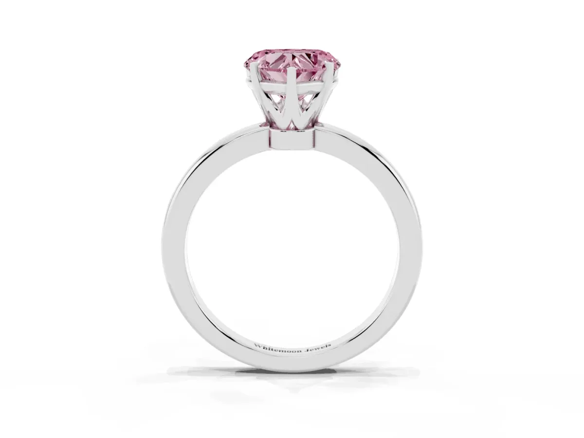 Fancy Pink Heart Cut Solitaire Diamond Ring with Six-Prong Setting on a Classic Band Silver