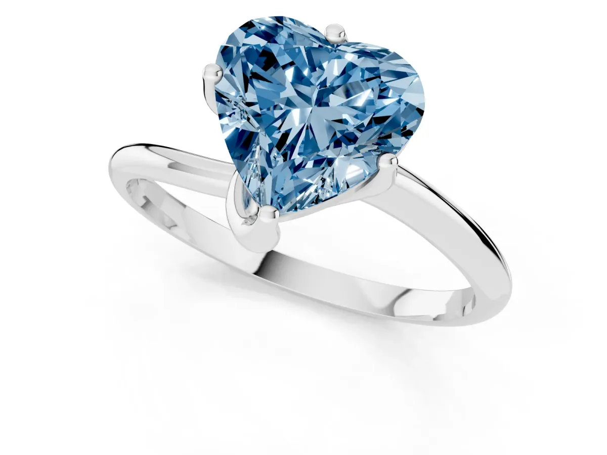 Fancy Blue Heart Cut Diamond Solitaire Engagement Ring with Four-Prong Setting and Classic Band Silver