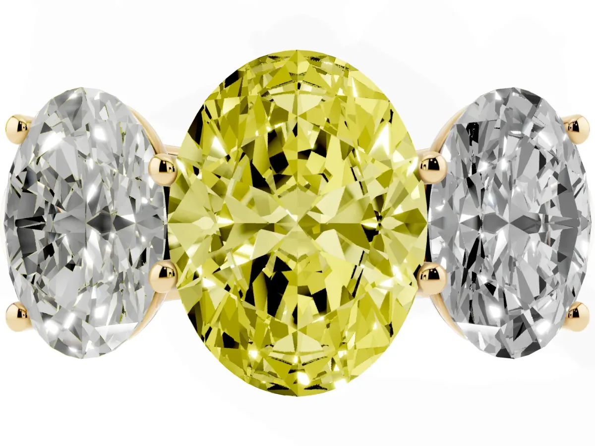 Fancy Yellow Oval Cut Three-Stone Diamond Ring with Prong Setting on a Classic Band Yellow gold