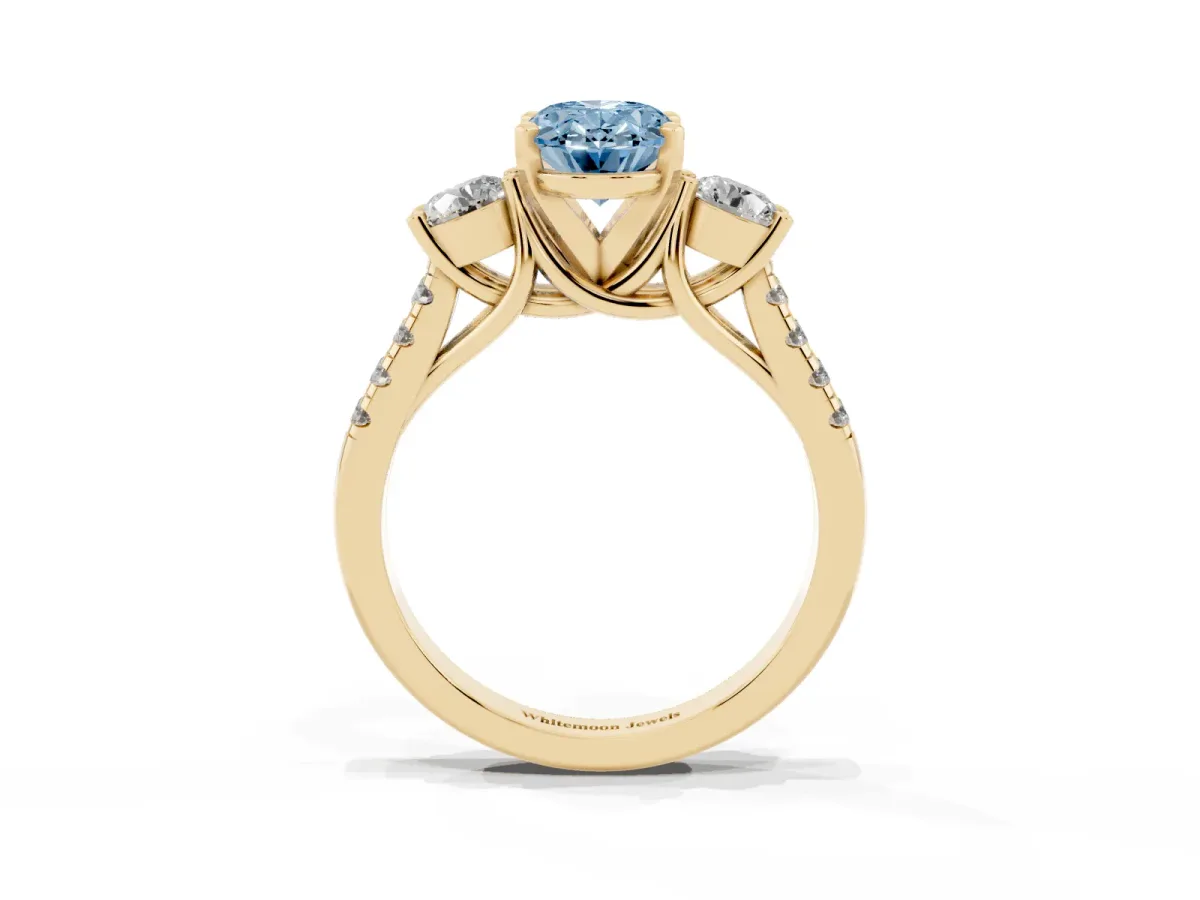 Fancy Blue Three-Stone Oval Cut Diamond Pavé Band with Four-Prong Setting Yellow gold