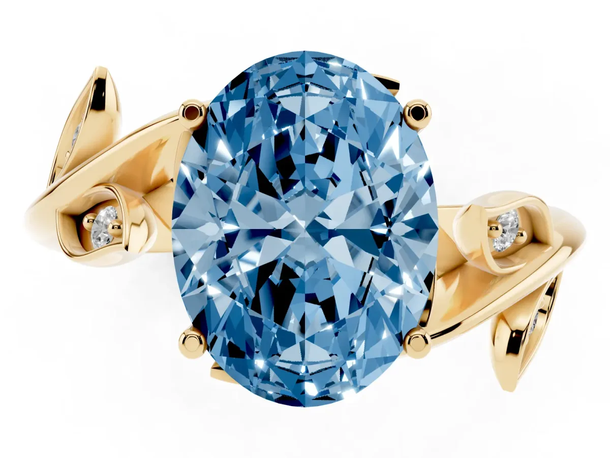 Fancy Blue Oval Cut Solitaire Twist Engagement Ring with Leaf Accents and Prong Setting Yellow gold