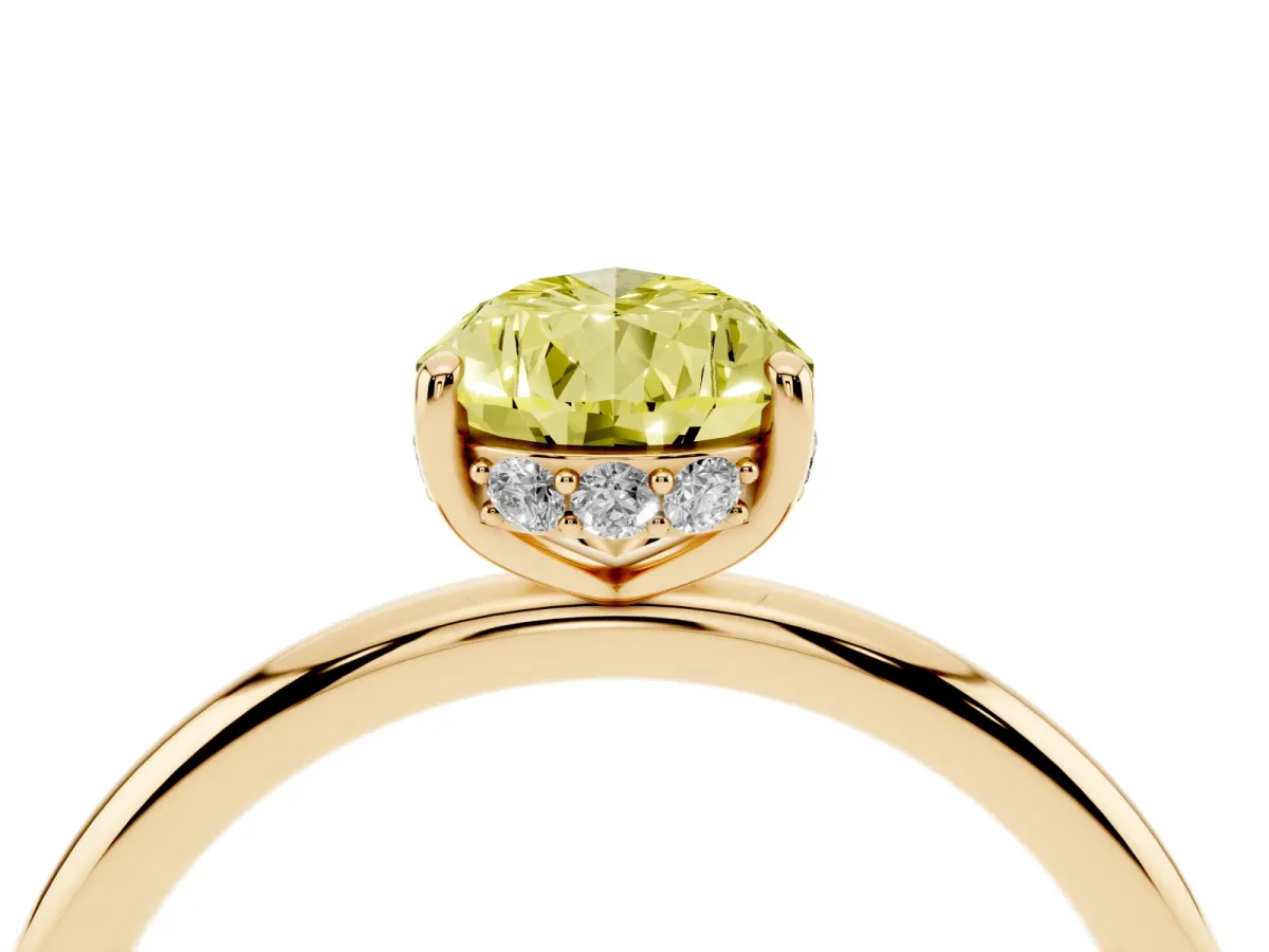 Fancy Yellow Pear Cut Solitaire Diamond Ring with a Classic Band and Four-Prong Setting Yellow gold