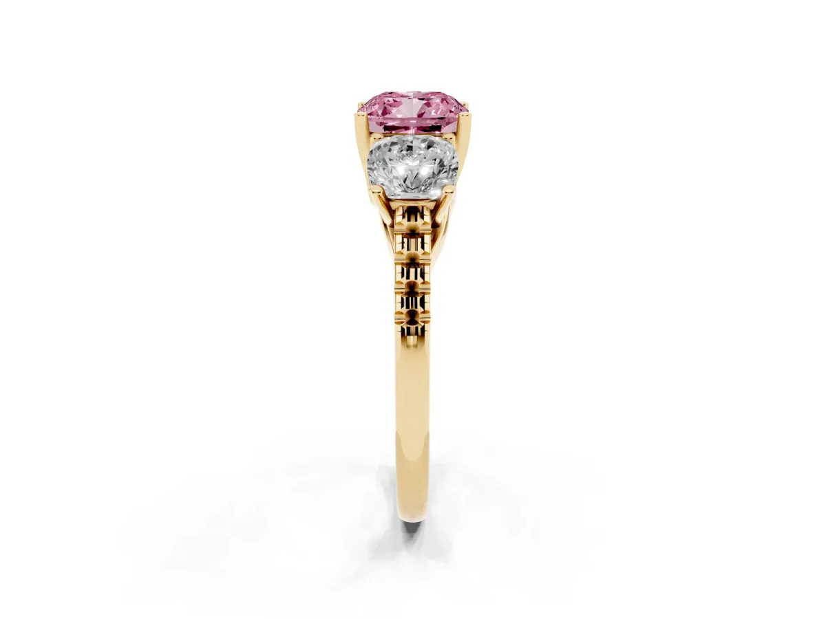 Fancy Pink Three-Stone Cushion Cut Diamond Ring with Round Pavé Band and Prong Setting Yellow gold