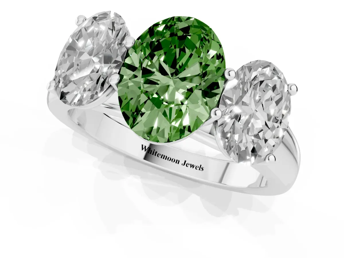 Fancy Green Oval Cut Three-Stone Diamond Ring with Prong Setting on a Classic Band Platinum