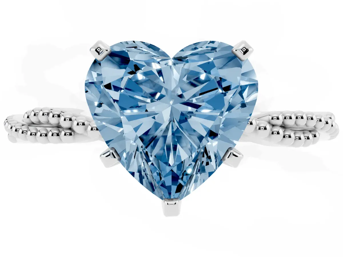 Fancy Blue Heart Cut Solitaire Twisted Band with Bead Prong Setting Platinum