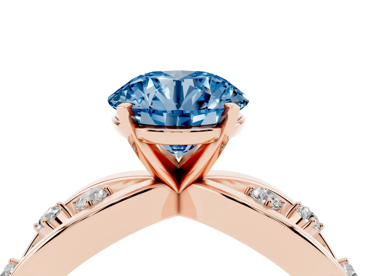 Fancy Blue Round Cut Cut Solitaire Diamond with Side Stones on Criss-Cross Band and Four-Prong Setting Rose gold