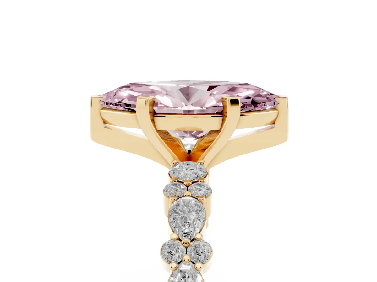 Fancy Pink Marquise Cut Diamond Side Stone Solitaire Ring with Round and Four-Prong Setting Yellow gold