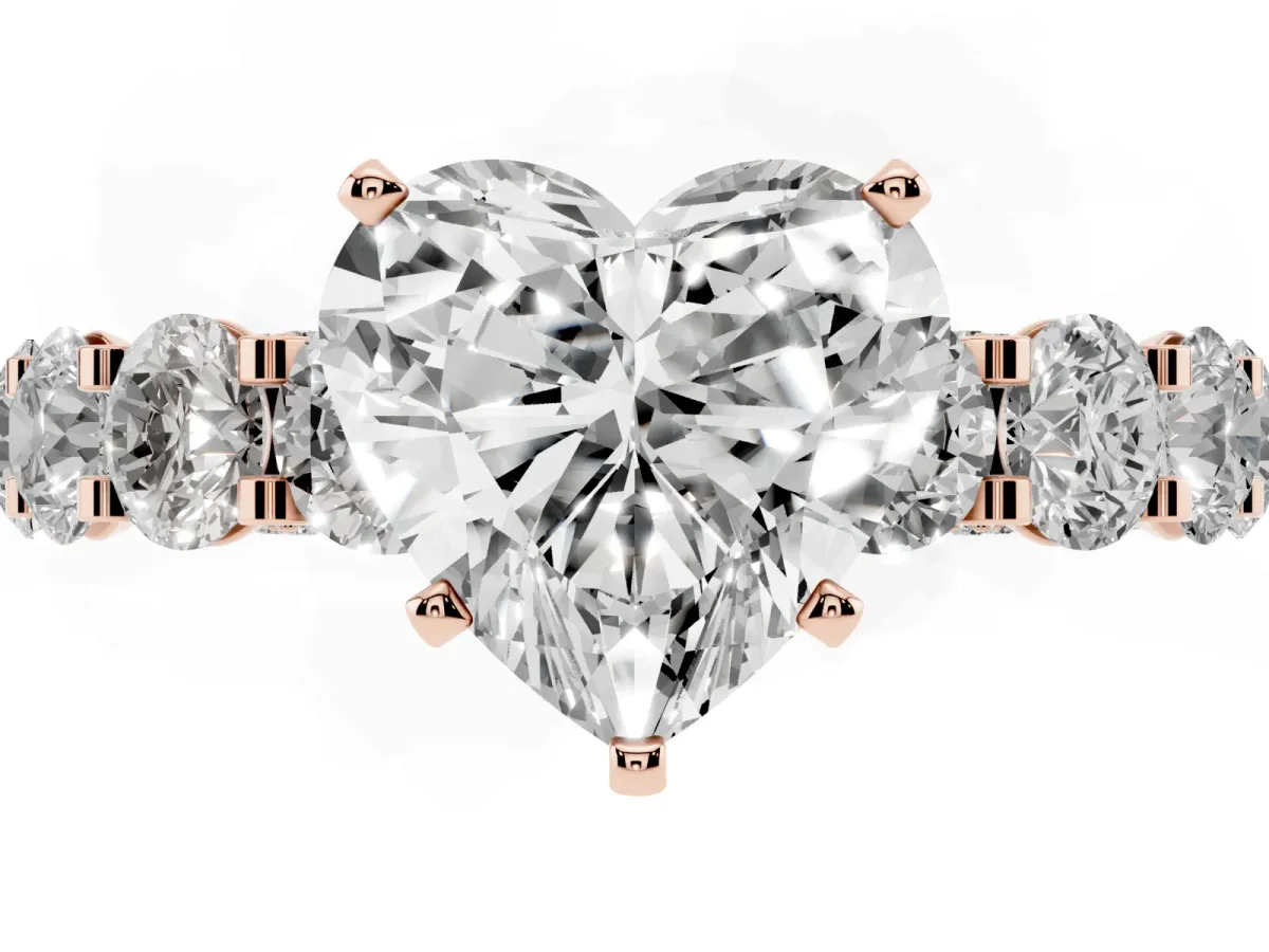 Heart Cut Diamond Side Stone Engagement Ring with Four-Prong Setting Rose gold