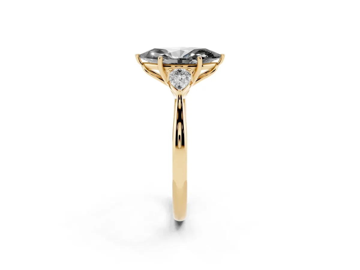 Fancy Black Marquise Cut Diamond Three-Stone Ring with Pear Side Stones and Prong Setting Yellow gold
