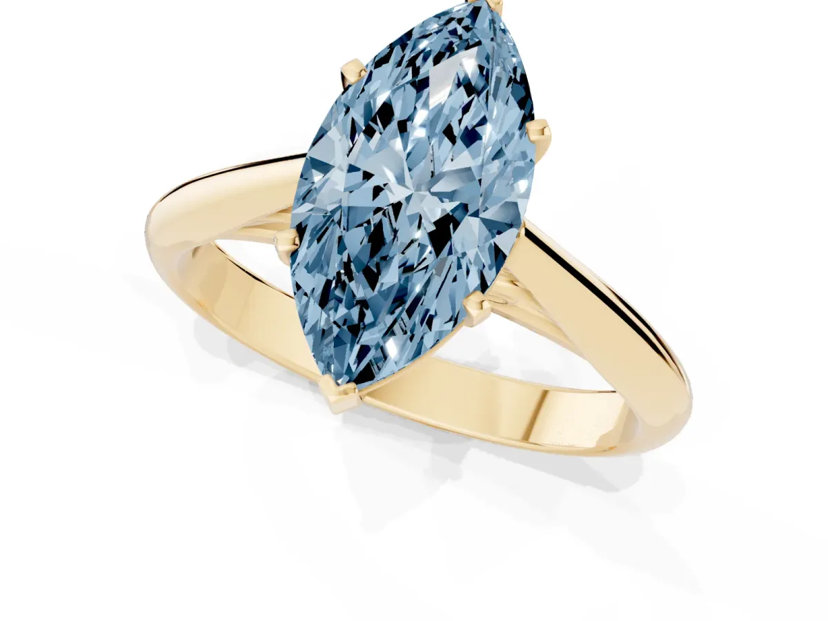 Fancy Blue Marquise Cut Diamond Solitaire Engagement Ring with Cathedral Setting and Four-Prong Mount Yellow gold