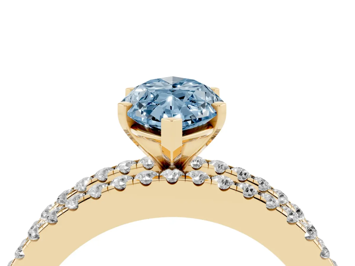 Fancy Blue Marquise Cut Diamond Solitaire Ring with Pavé and Channel Set Band Yellow gold