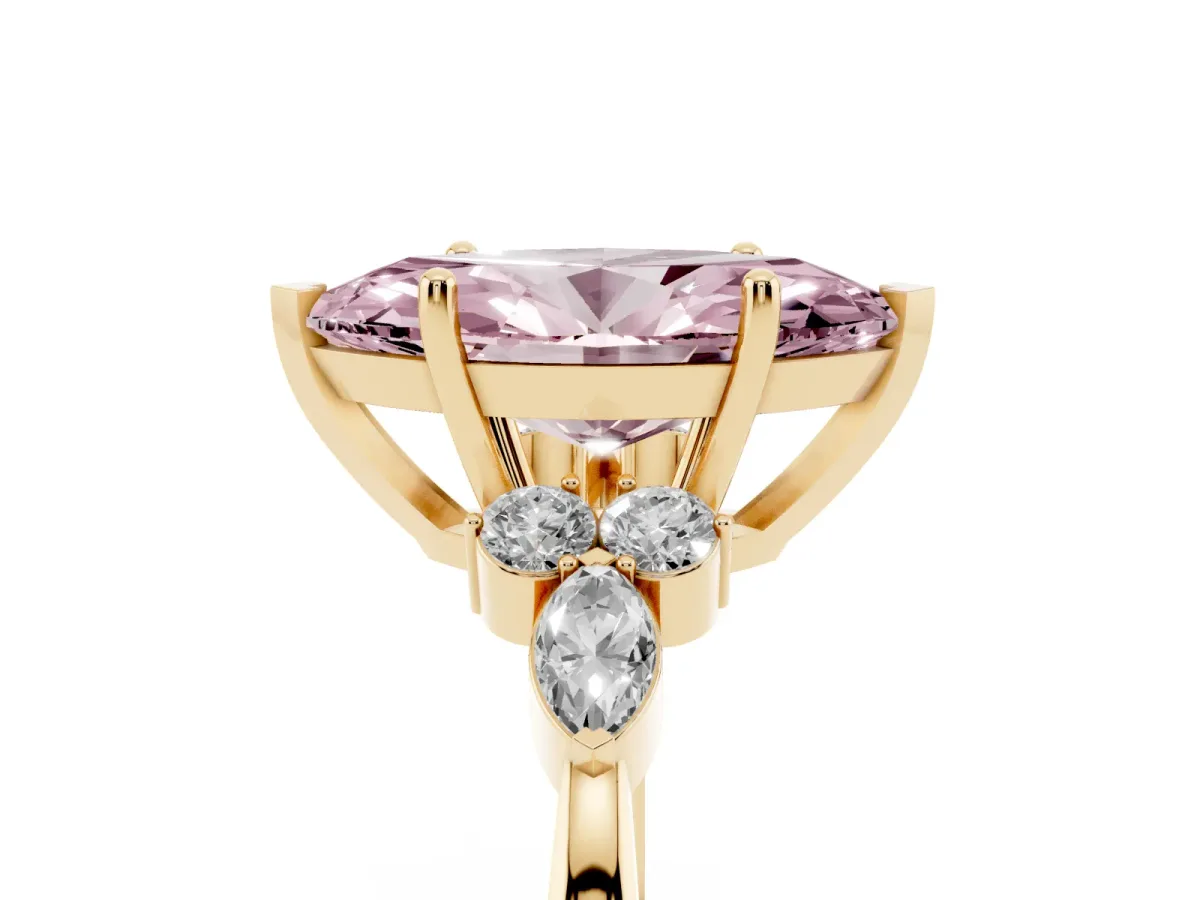 Fancy Pink Marquise Cut Brilliant Diamond Solitaire Ring with Pear Side Stones and Four-Prong Setting Yellow gold