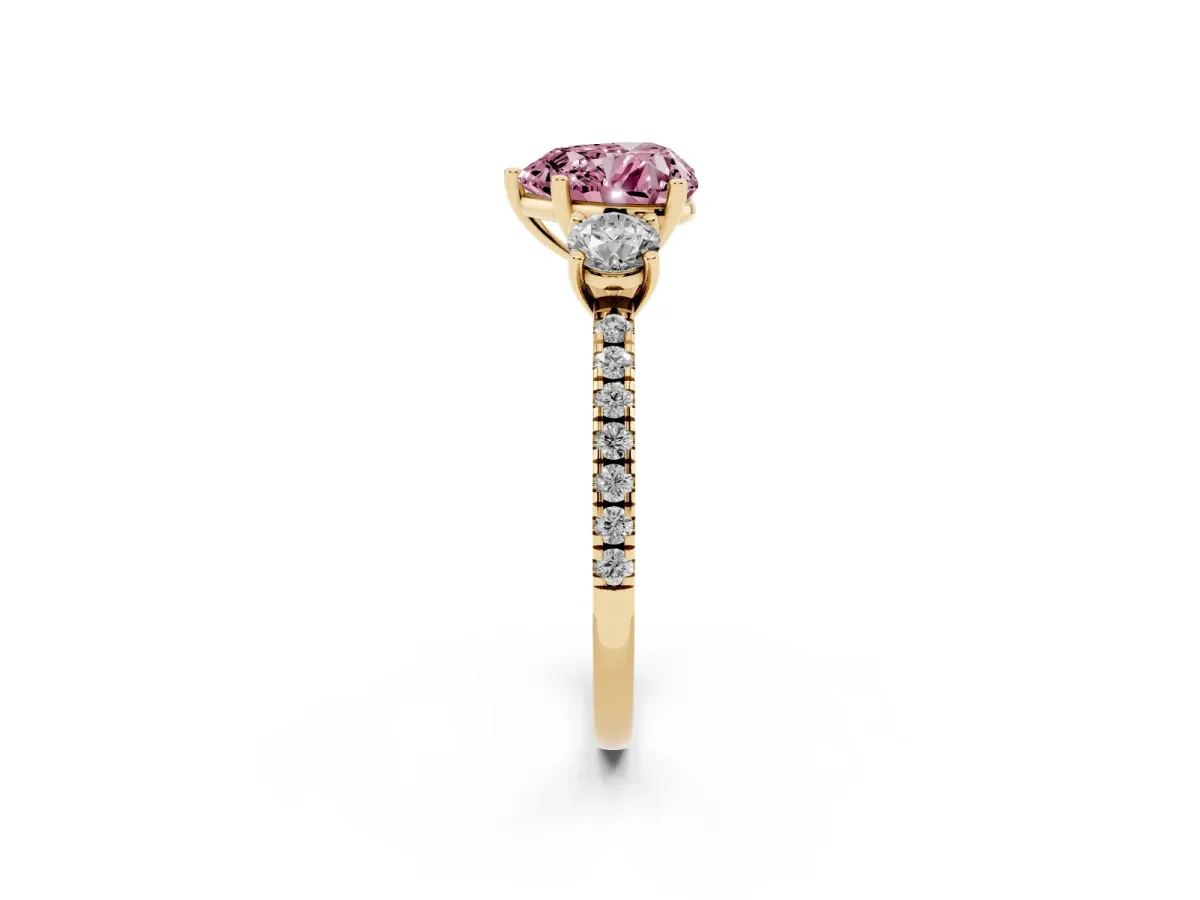 Fancy Pink Three-Stone Heart Cut Cut Diamond Pavé Band with Prong Setting Yellow gold